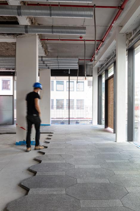 2021 - Installation of the reclaimed granite flooring ©Jasper Van der Linden 