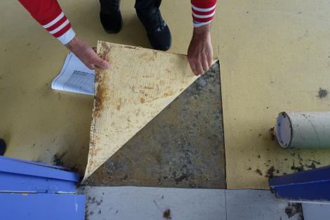 Uncovering the original concrete floor