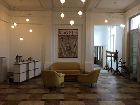 Interior of the lobby, with furniture made with reclaimed elements