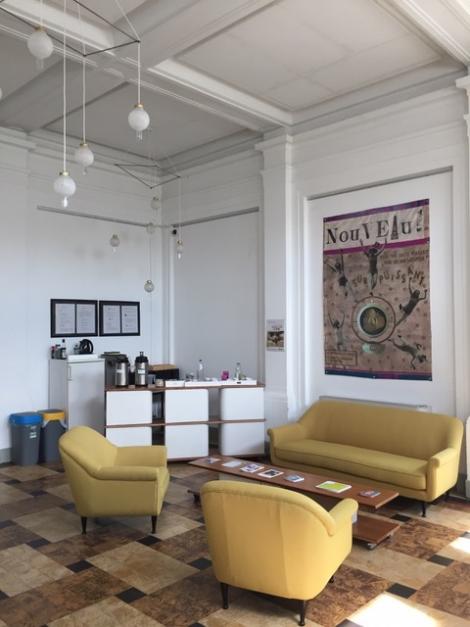 Interior of the lobby, with furniture made with reclaimed elements